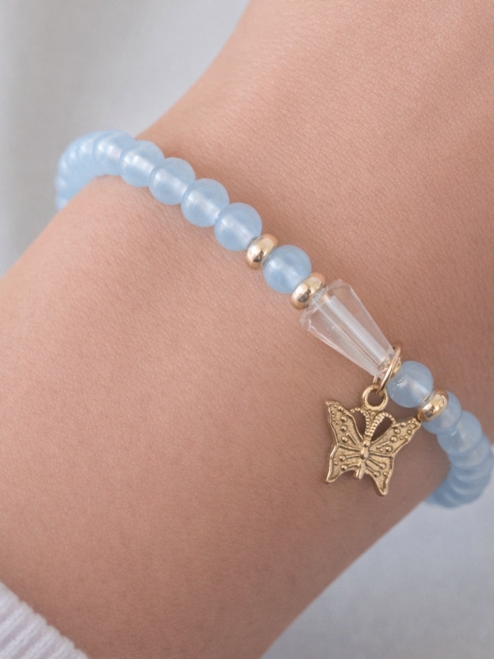 7 Inch Gold Butterfly Charm Blue Beaded Stretch Bracelet